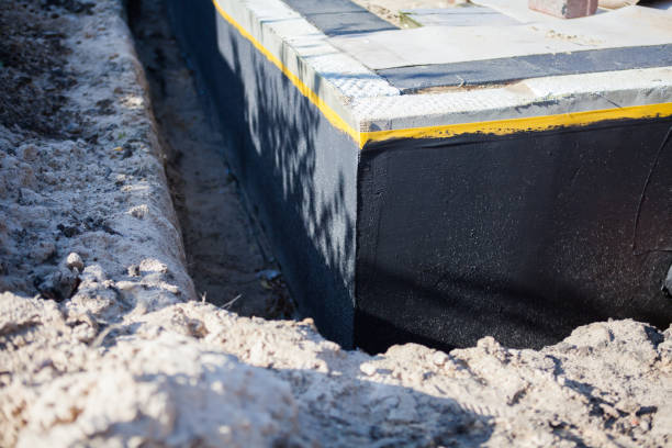 Professional Waterproofing technician working in Alabaster, AL